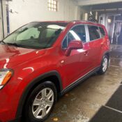 Spotless, freshly cleaned car at Windsor's premier car wash and detailing service. Drive-thru and monthly car wash plans available