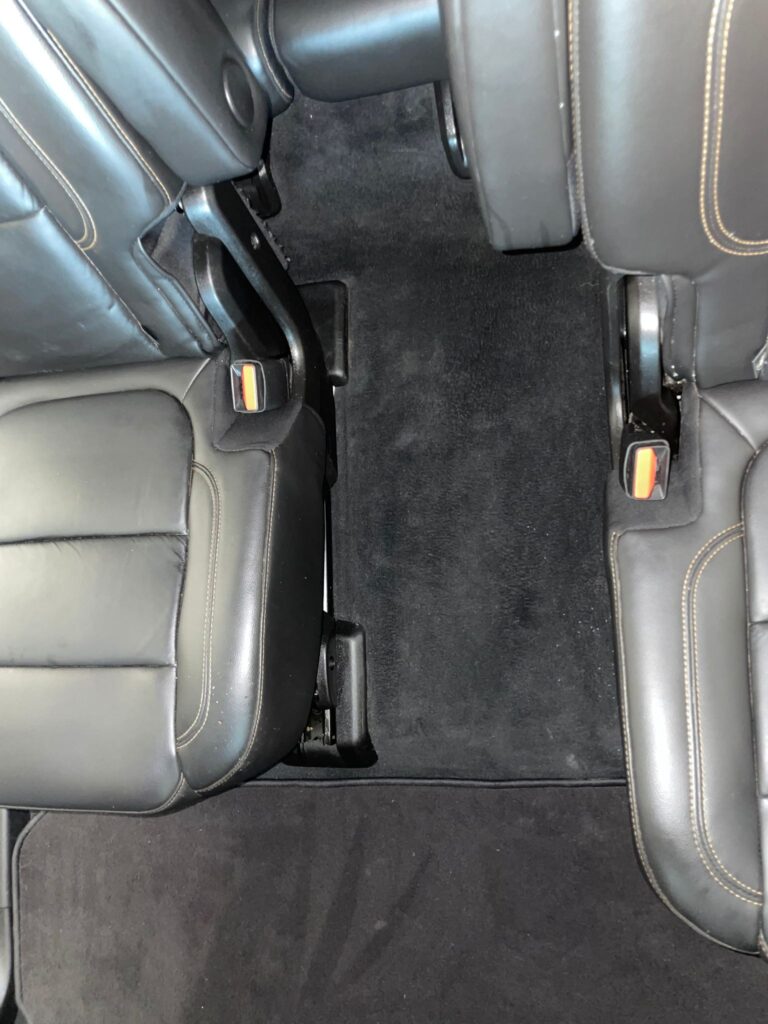 A photo showing vacuuming, steam, or deep interior cleaning.